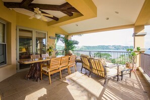 Outdoor dining - Ocean View Luxury Condo next to pool + access to all amenities. (Herradura)