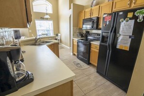 House, 4 Bedrooms | Private kitchen | Fridge, oven, toaster - Private Pool Home Conservation View 4 Bedroom Home by RedAwning (Haines City)