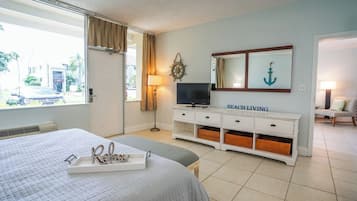 1 bedroom, desk, iron/ironing board, travel crib