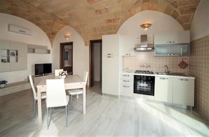 Fridge, oven, cookware/dishes/utensils