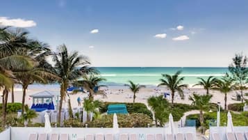On the beach, sun loungers, beach towels