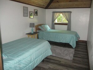 View of main floor bedroom with 2 twin
beds