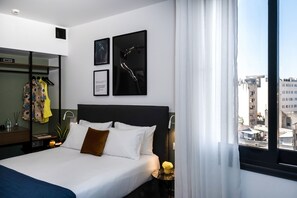Premium bedding, pillowtop beds, in-room safe, blackout drapes