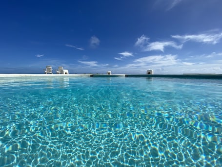 Outdoor pool, open 7:30 AM to 8:00 PM, sun loungers