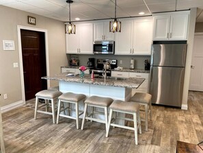 Coffee/tea maker, fridge, microwave, oven