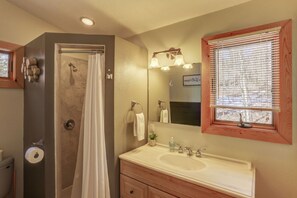 Bathtub, hair dryer, towels