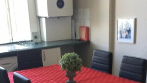 Apartamento standard | Opções para refeição no quarto