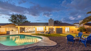 A pool area with a covered patio, outdoor seating, and a barbecue station. - Scottsdale Kierland Oasis: Heated Pool, Golf & More (Scottsdale)