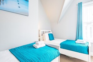 2 habitaciones, tabla de planchar con plancha, wifi y ropa de cama