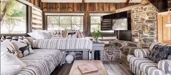 Meadowlands Cottage, on working Horse ranch with a river flowing through it.