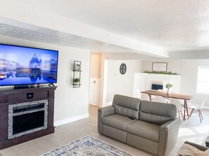 Smart TV, fireplace, books