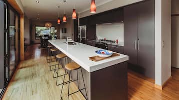 Coffee/tea maker, fridge, microwave, oven