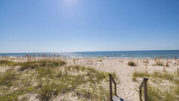 On the beach, sun-loungers, beach towels