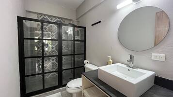 Shower, hair dryer, towels, soap