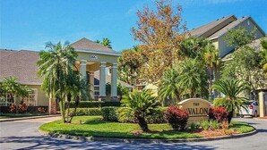 A building with a sign reading "The Valon" surrounded by well-maintained landscaping and palm trees. - Newly renovated, free WIFI/PARKING, 10 min to the beach! (Clearwater)