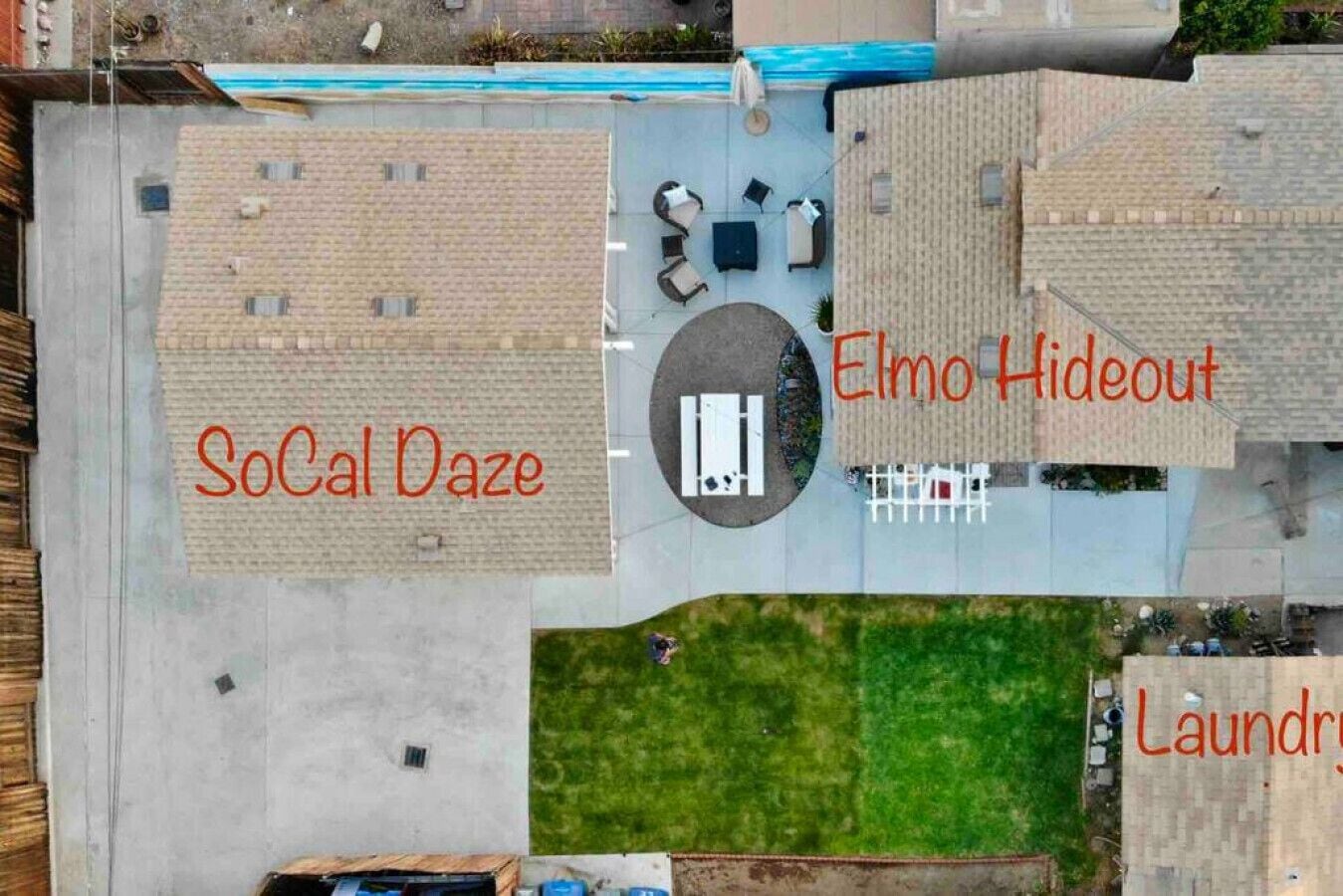 An aerial view of a residential area with labeled sections: SoCal Daze, Elmo Hideout, and Laundry.