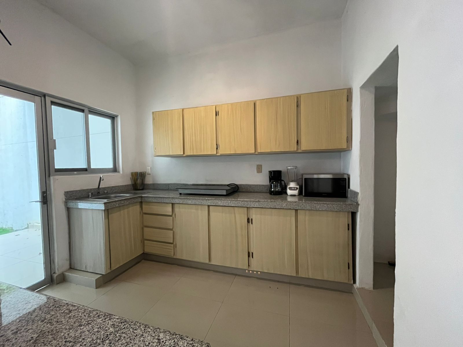 Microwave, blender, cookware/dishes/utensils