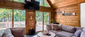 Lakefront home with boat mooring, deck, hot tub, game room & fast WiFi - dogs OK