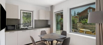 Appartamento "Hofer Maria" con vista sulle montagne, Wi-Fi, terrazza e giardino