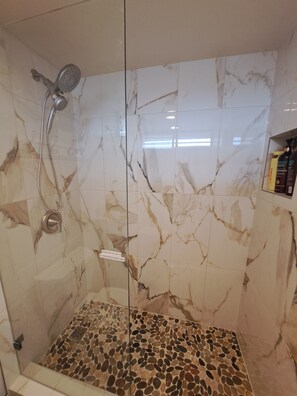 Combined shower/tub, hair dryer, towels, soap