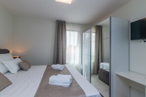 2 habitaciones, tabla de planchar con plancha y wifi gratis 