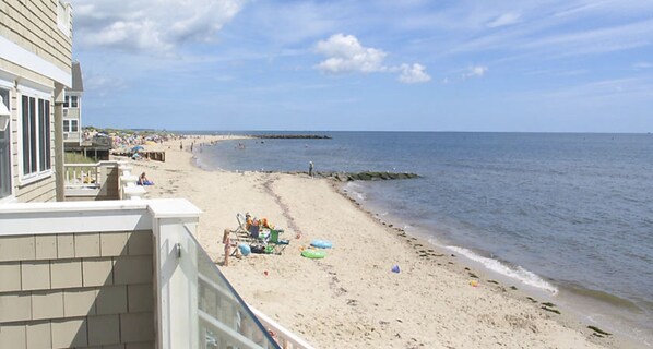 On the beach, sun loungers, beach towels