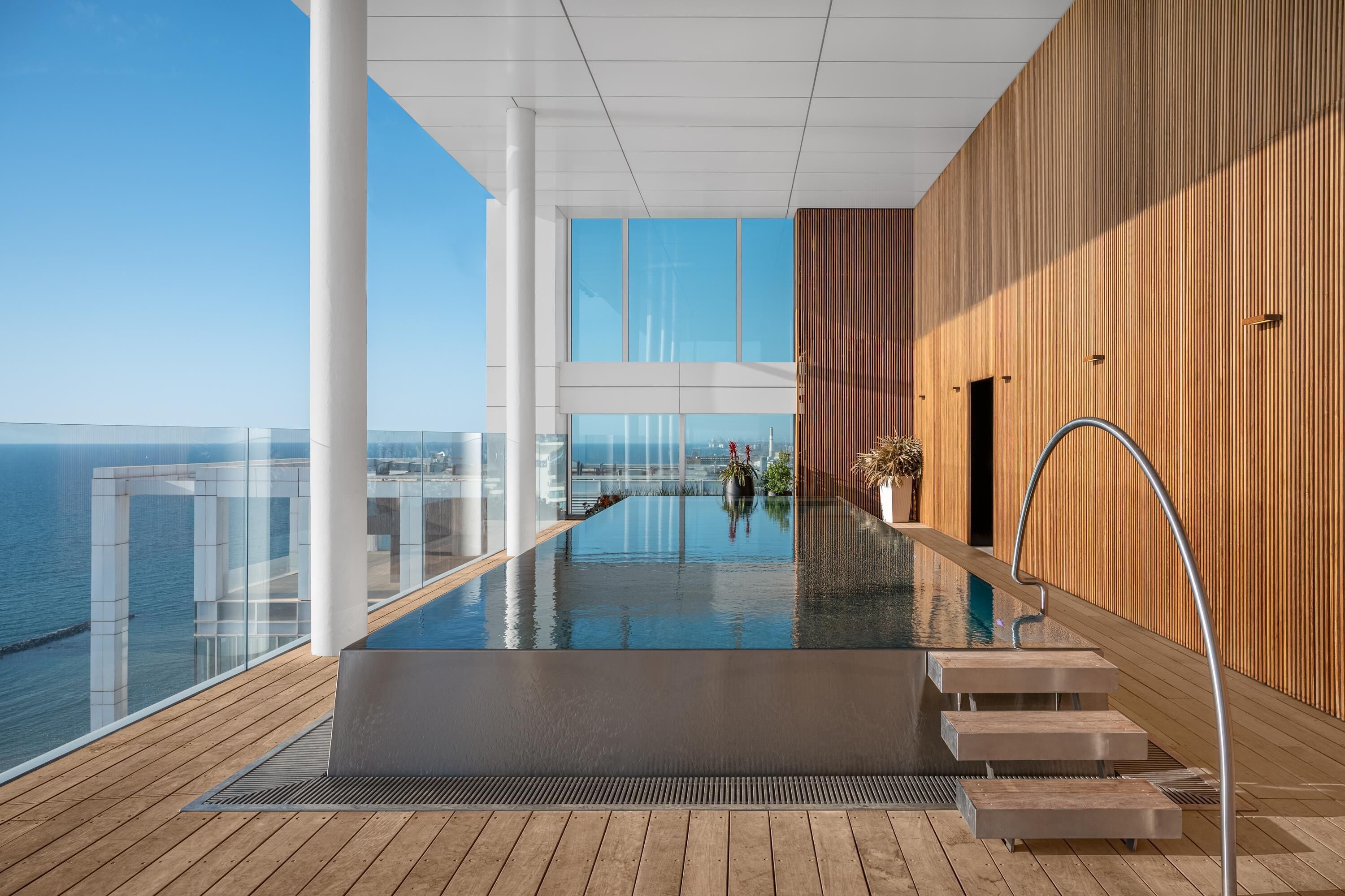 outdoor pool, pool umbrellas, pool loungers