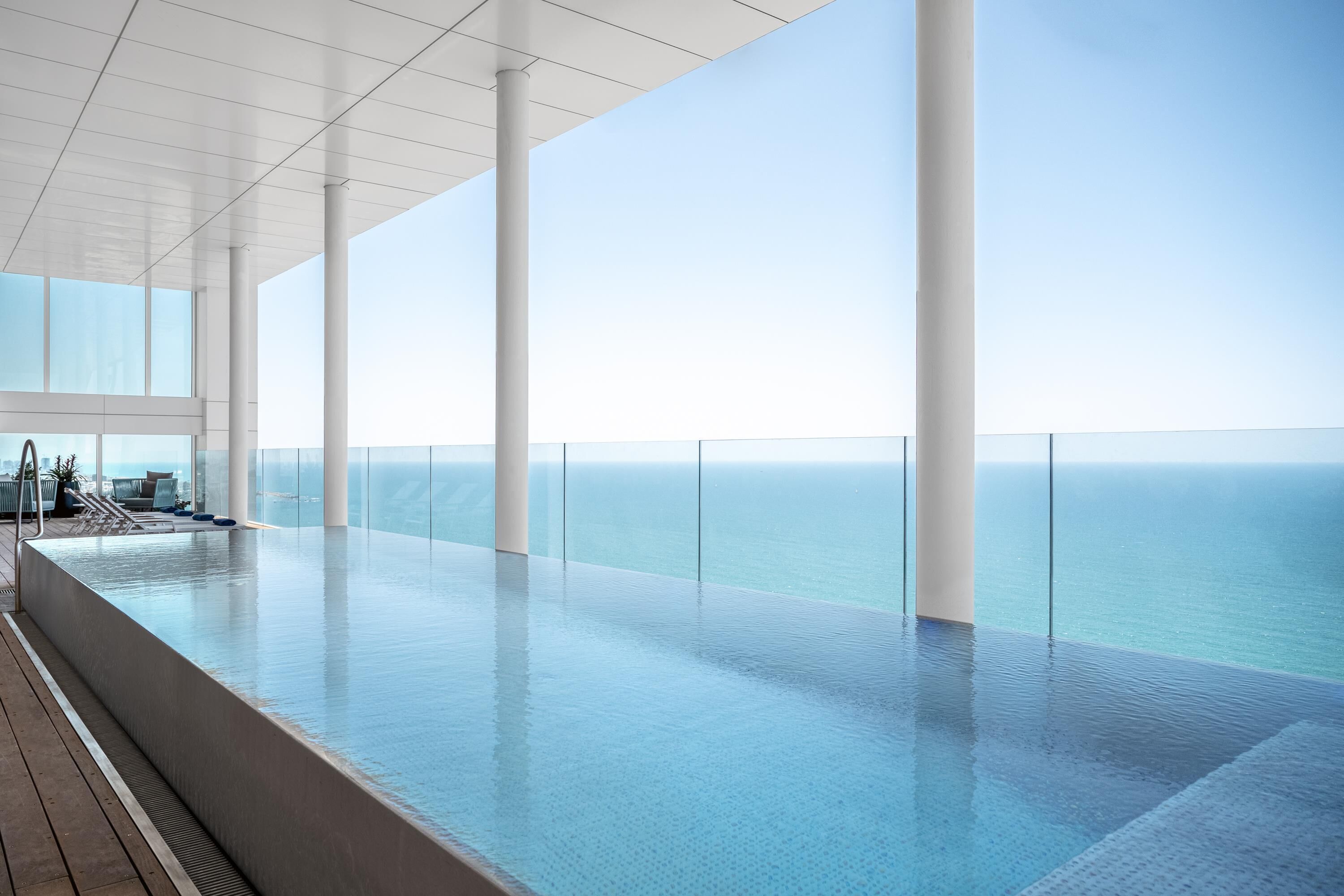 outdoor pool, pool umbrellas, pool loungers