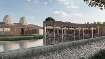 Alberca al aire libre, sombrillas en la alberca y camastros