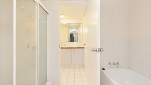 Bathtub, hair dryer, towels