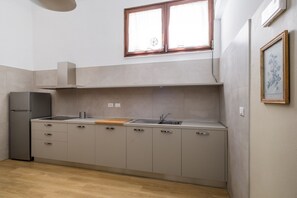 Fridge, dishwasher, electric kettle, cookware/dishes/utensils