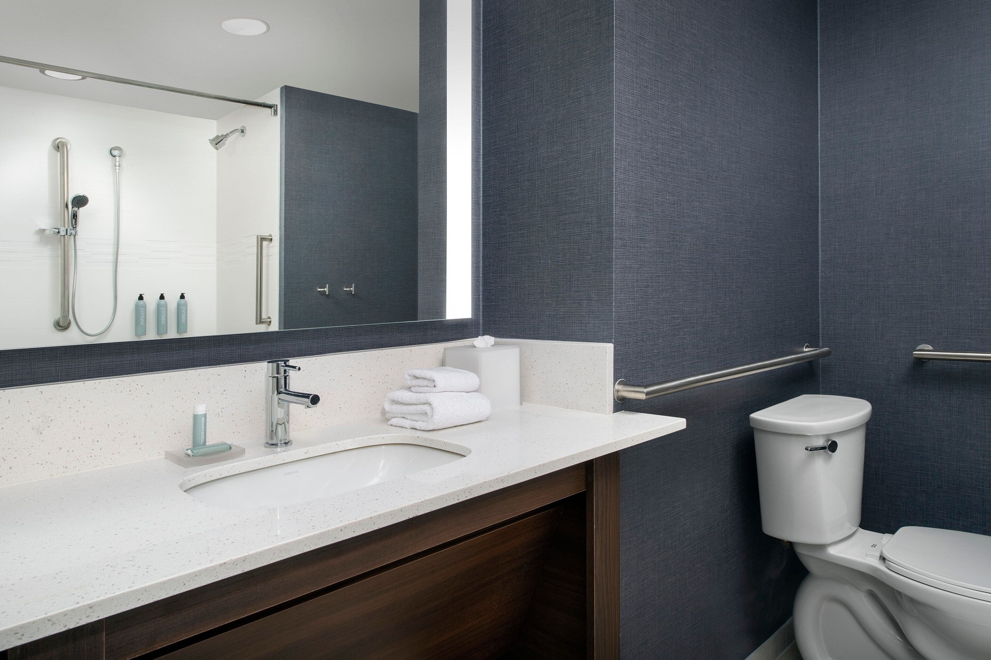 shower, free toiletries, hair dryer, towels