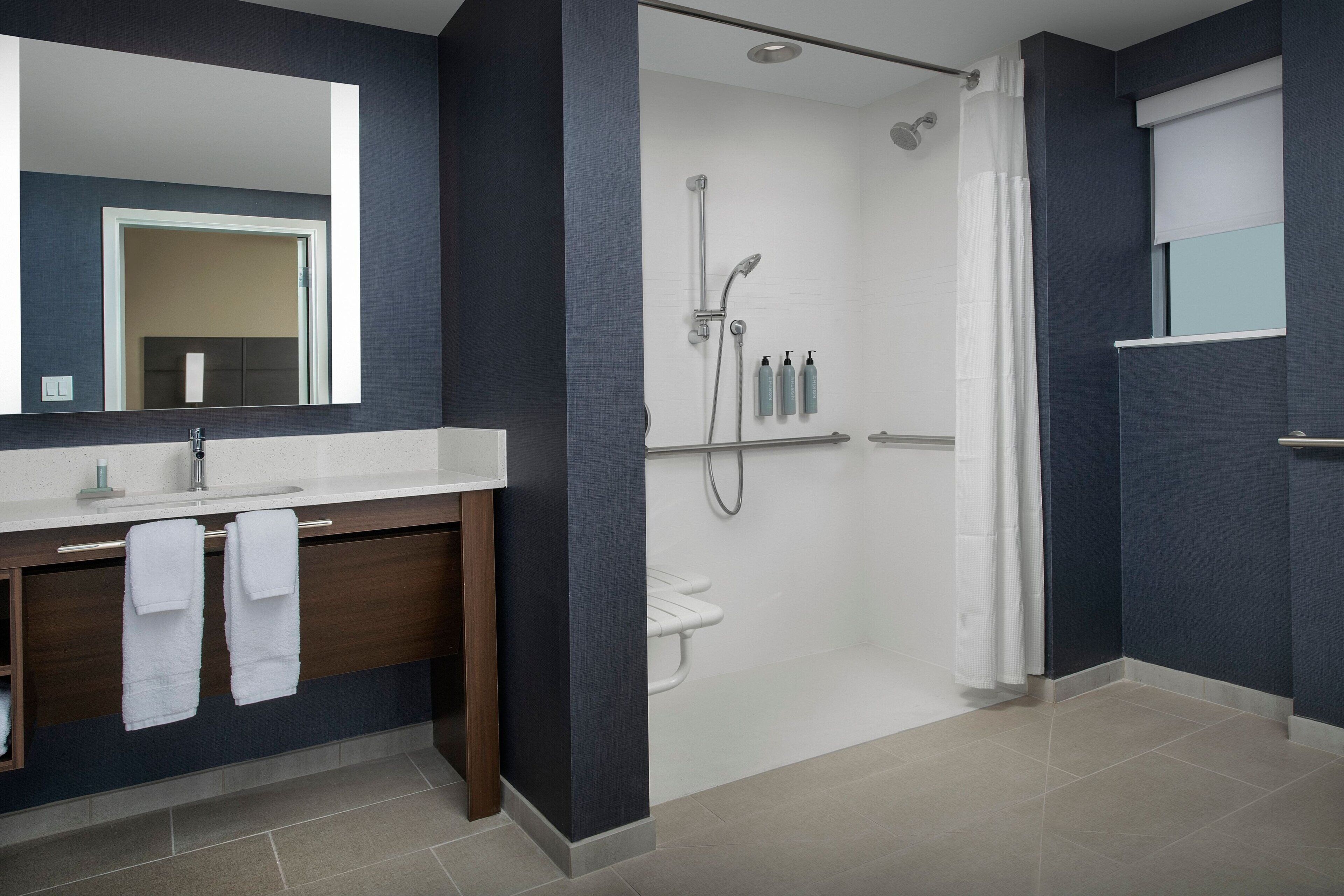 shower, free toiletries, hair dryer, towels