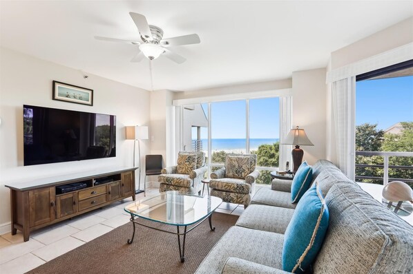 Flat-screen TV, DVD player, smart speakers