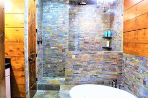 Bathtub, hair dryer, towels