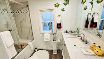 Baignoire, sèche-cheveux