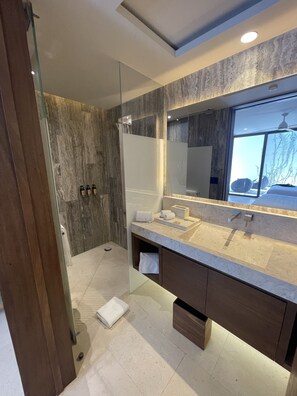Shower, hair dryer, towels, soap