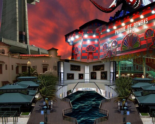 A hotel with a large, colorful facade featuring the text "PARQUE DE BOMBAS." - Mavs Boutique Hotel (Ponce)