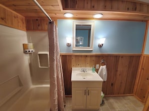 Combined shower/tub, hair dryer, towels, soap