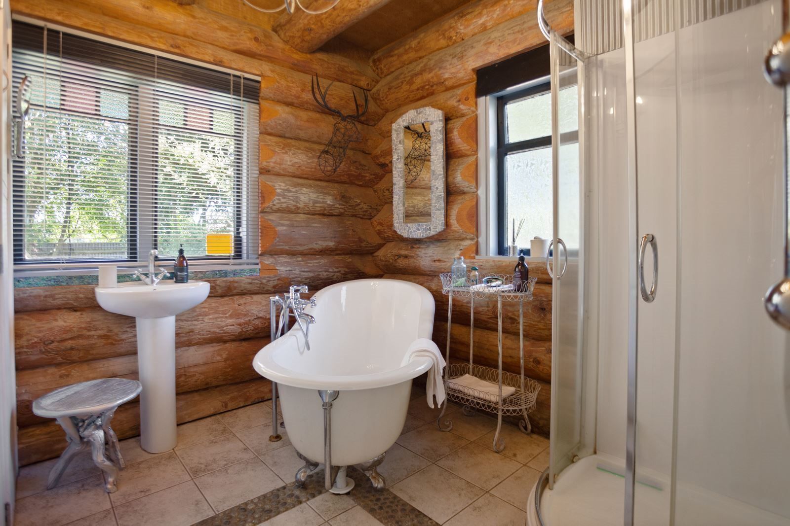 Combined shower/bathtub, towels, soap, toilet paper