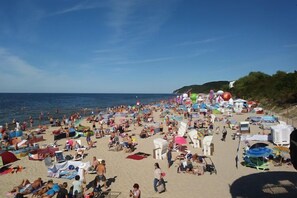 Guests can enjoy beachside amenities and stunning ocean views.