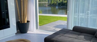 Apartments -Saaldorf WG 2, terrace and view of the reservoir