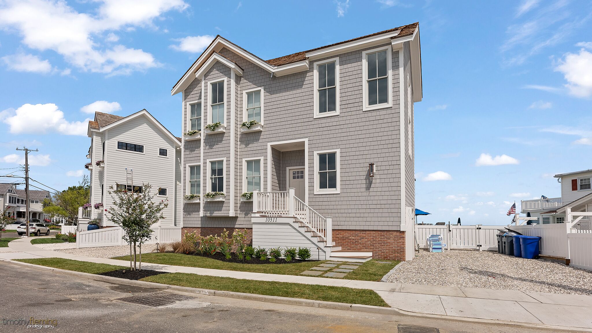 EXCEPTIONAL LUXURY, CUSTOM, NEW CONSTRUCTION BAY FRONT HOME WITH POOL AND 3-STOP ELEVATOR.