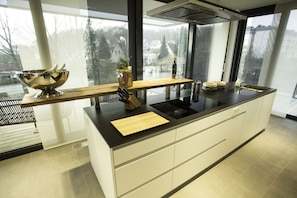 Dishwasher, high chair, dining tables