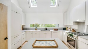 Microwave, oven, stovetop, coffee/tea maker - Contemporary and serene estate with heated saltwater pool, expansive... (East Hampton)