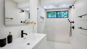 Bathtub, hair dryer, towels