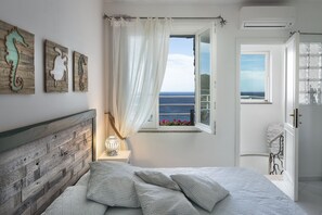4 chambres, coffres-forts dans les chambres, fer et planche à repasser