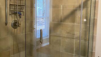 Bathtub, hair dryer, towels, soap