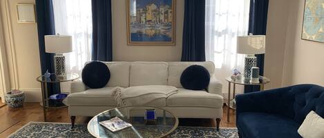 Smart TV, fireplace, books, printers