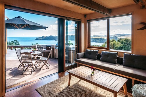 Designer living with stunning views across the bay, a spa and coast walks.